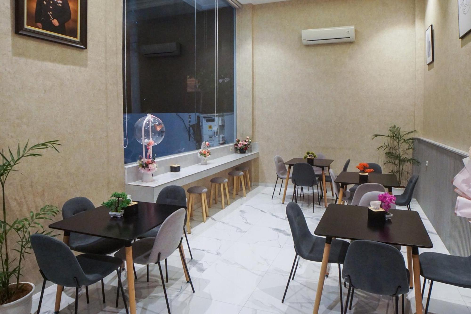 Super Oyo Capital O 92066 Papakoel Hotel & Cafe メダン エクステリア 写真